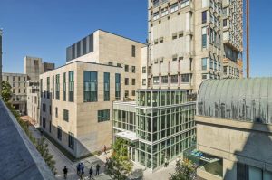 Boston University School of Law: Redstone building with Sert tower rising above the new atrium. Pappas Law Library at right.