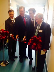 (l-r) Interim Executive Director and Medical Director of the Boston Public Health Commission Dr. Huy Nguyen, MLSC Vice President for Communications and Marketing Angus McQuilken, Chief Scientific Officer at Dana-Farber Barrett Rollins, MD, Dana-Farber President and CEO Edward J. Benz Jr., MD. participate in a ribbon-cutting ceremony to celebrate the official opening of Dana-Farber’s Molecular Cancer Imaging Facility in Boston’s Innovation District.