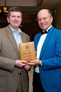 (l-r) David Pinsky, President and CEO of Tighe & Bond accepting EBJ award from Grant Ferrier, Chairman of the Environmental Industry Summit, at the awards banquet in San Diego.