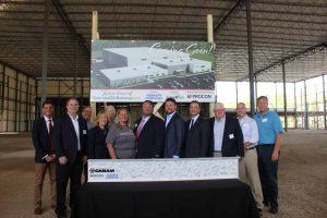 (l-r) Matthew R Bartlett, Special Assistant to Senator Kelly Ayotte; Russell Dean, Town Manager of Exeter, NH; John Samenfeld, Vice Chairman of PROCON; NH Governor Maggie Hassan; Paul Roy, Director of Business Development of PROCON; Trudy Abood, Vice President of GourmetGiftBaskets.com; Ryan Abood, President and CEO of GourmetGiftBaskets.com; Jeff Abood, Vice President of GourmetGiftBaskets.com; Jeffrey Rose, Commissioner for the State of NH Department of Resources and Economic Development; Tom Monahan, Developer Monahan Companies; Darren Winham, Economic Development Director Town of Exeter; David Sharples, Town of Exeter Director of Planning and Development Service
