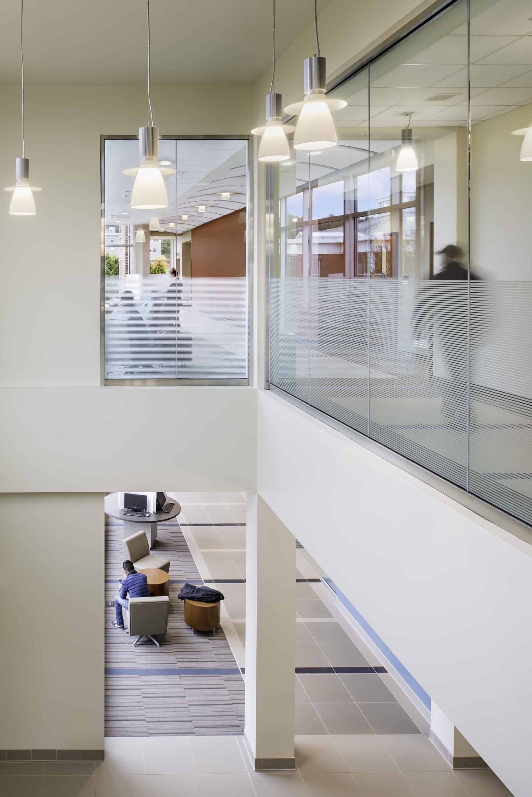 Informal gathering spaces are strategically located to allow impromptu interactions in Central Maine Community College’s Learning Tower. Access to technology, flexible furniture and comfortable aesthetics invite collaboration between students and faculty© Blind Dog Photography