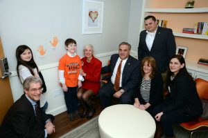 Members of the KBE team gathered to celebrate the new NICU library at Connecticut Children’s Medical Center. (l-r) Allan Kleban, KBE; Isabelle Skulte; Alex Skulte; Barrie Deschaine, KBE; Mike Kolakowski, KBE; Michael Kolakowski, Jr., KBE; Jonelle Lawhorn, KBE; Sierra Fournier, KBE)© KBE Building Corp.
