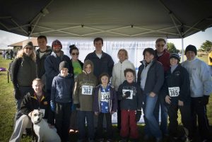 KBE Building Corporation employees and their loved ones participate in the Race for The Cove on Oct. 18 to benefit The Cove Center for Grieving Children.