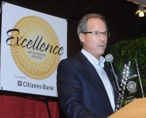 Mark Stebbins at podium / Andruskevich Photography