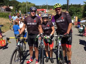 (l-r) Jim Scarpone, director at Shawmut Design and Construction and Team Shawmut captain; first-time rider Jennifer Morris, project manager at Shawmut Design and Construction; Les Hiscoe, CEO of Shawmut Design and Construction.