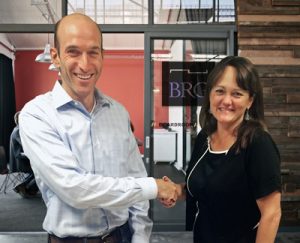 Traci-and-Peter Stein making the deal.