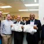 (l to r) ack Hoppin, inviCRO Co-Founder and Managing Director; Marc Seaman, inviCRO Imaging Scientist; Deval Patrick, Governor of the Commonwealth of Massachusetts; Maurice "Mo" Cowan, Former U.S. Senator; Matt Silva, inviCRO Senior Director of Imaging Research; and (behind) the inviCRO Lab Team celebrate inviCRO’s expanded development agreement with Israel-based Aspect Imaging